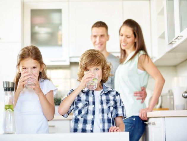 boy and girl drinking water