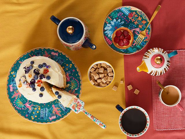 lucy tiffney plates and teapot flatlay - goodhomesmagazine.com