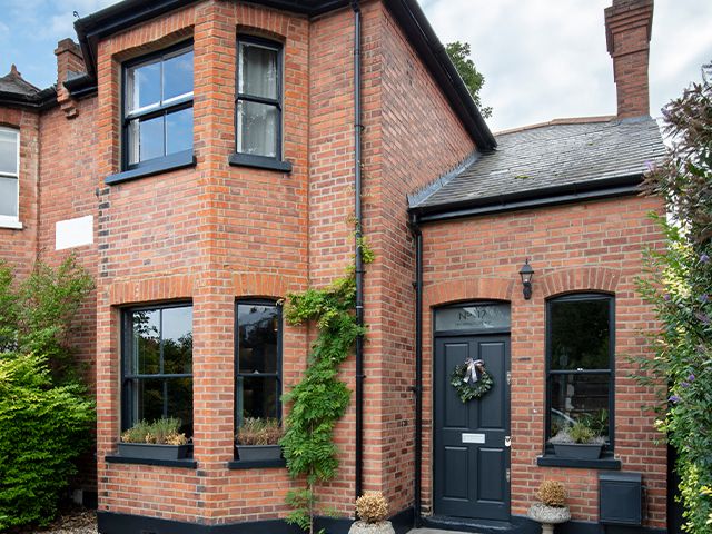 exterior brick and black house - how to get the asking price when selling your home - news - goodhomesmagazine.com
