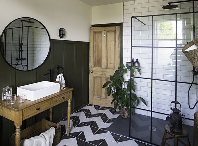 traditional modern bathroom with green wall panelling - goodhomesmagazine.com