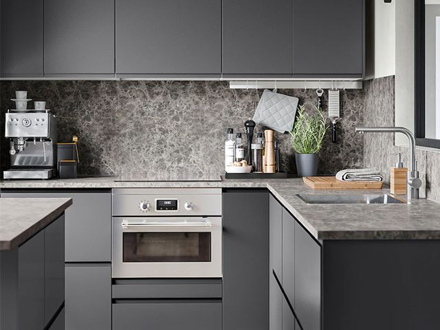 grey kitchen laminate worktop and matching splashback in a grey kitchen