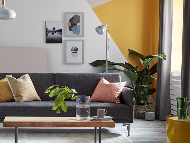 grey sofa pink cushion - Dr Dawn's top tips on creating a mindful home - inspiration - goodhomesmagazine.com