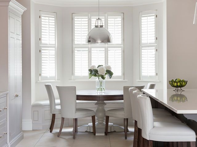kitchen with built-in window seating from Humphrey Munson - goodhomesmagazine.com