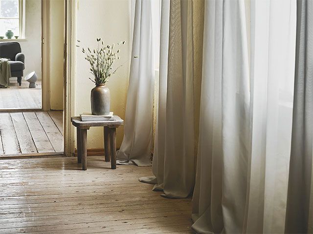ikea's air purifying curtains in a home - living room goodhomesmagazine.com