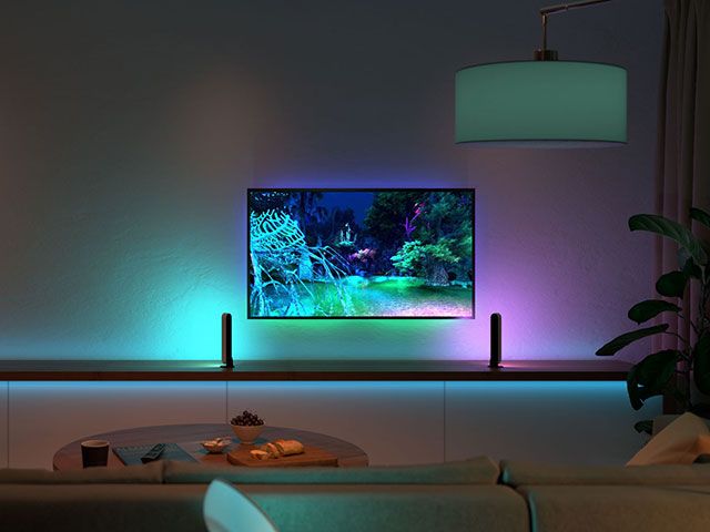 backlit tv with colourful lights in living room - goodhomesmagazine.com 