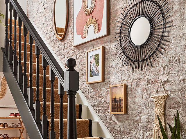 Adding framed artwork to your stairs brings a touch of interest