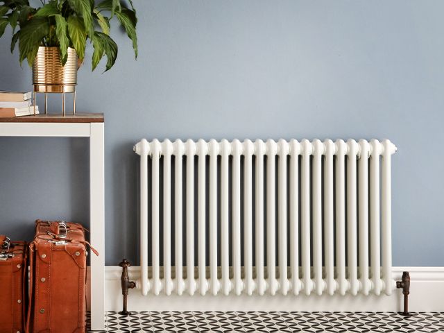 white column radiator - 5 ways to save money on your heating - inspiration - goodhomesmagazine.com