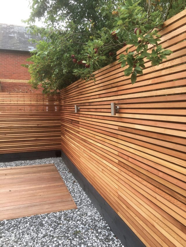 wooden fencing with gravel