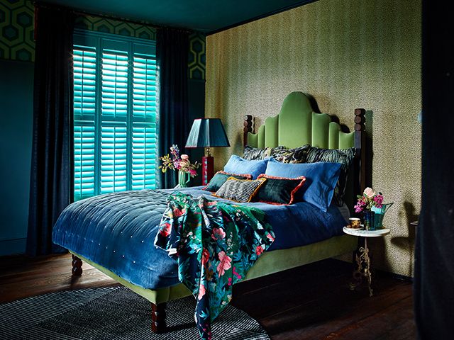 custom shutters in a maximalist pattern bedroom.- hillarys - goodhomesmagazines.com