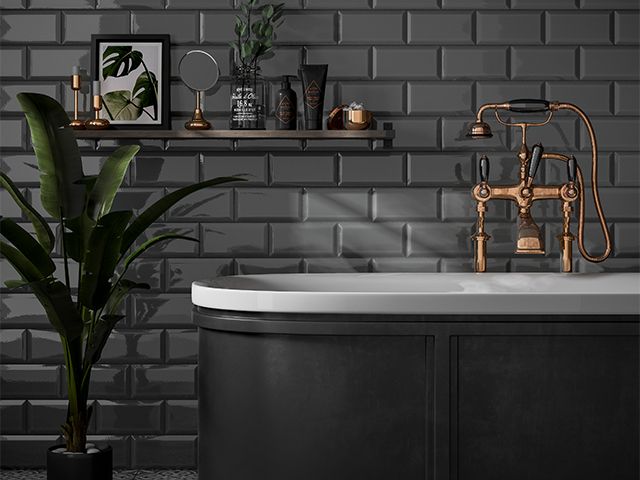 black and copper bath - how to use black in your bathroom - bathroom - goodhomesmagazine.com