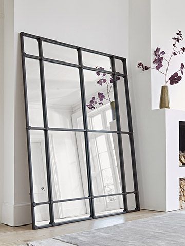 black framed oversized mirror - industrial living room: 5 top styling tips - living room - goodhomesmagazine.com