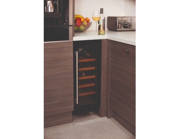 corner of kitchen with wine cooler fruit bowl toaster and wine