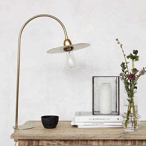 gold curved desk lamp - 6 of the best statement desk lamps - home office - goodhomesmagazine.com