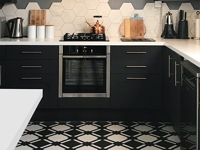 monochrome tiled flooring - how to update your kitchen with patterned tiles - kitchen - goodhomesmagazine.com