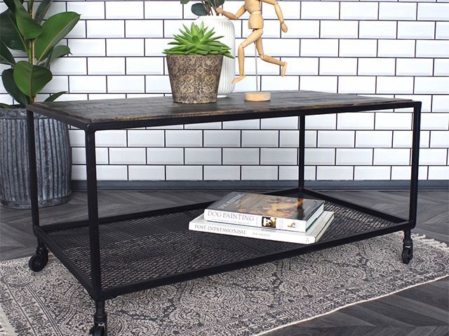 moveable black coffee table - industrial living room: 5 top styling tips - living room - goodhomesmagazine.com