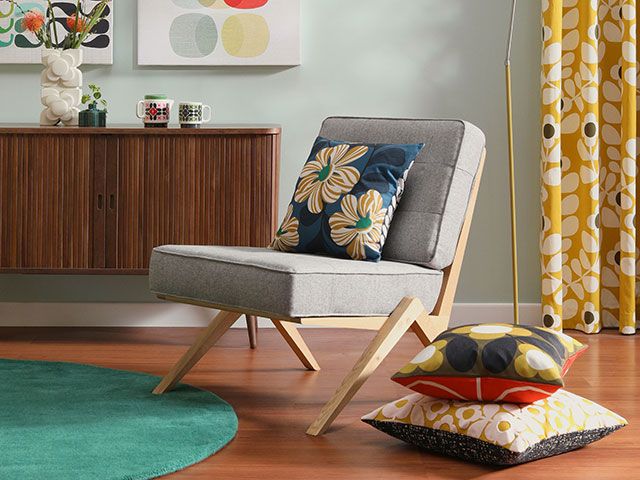 retro living room decorated with Orla Kiely cushions and curtains from new John Lewis collection - goodhomesmagazine.com