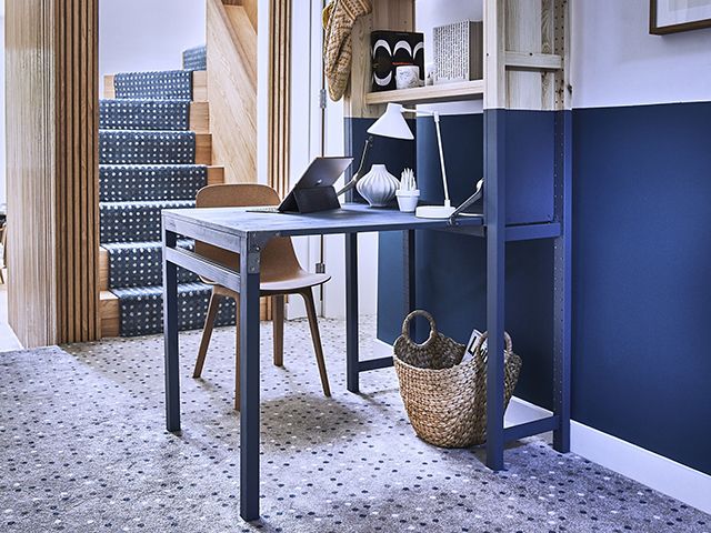 hallway with makeshift desk office painted in blue - goodhomesmagazine.com