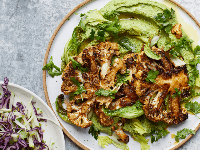 Roasted cauliflower with herby chermoula dip and slaw - Credit: Melissa Hemsley