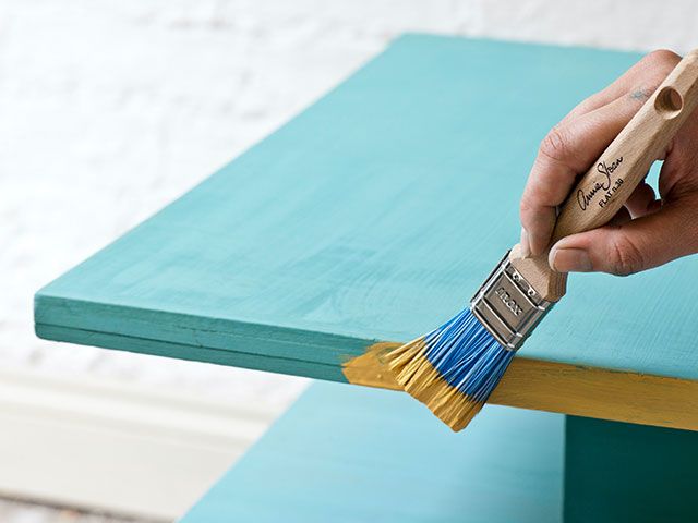 blue paintbrush - how to update a Mid-Century side table - inspiration - goodhomesmagazine.com