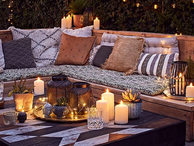 boho outdoor seating area - how to create a cosy garden seating area - garden - goodhomesmagazine.com