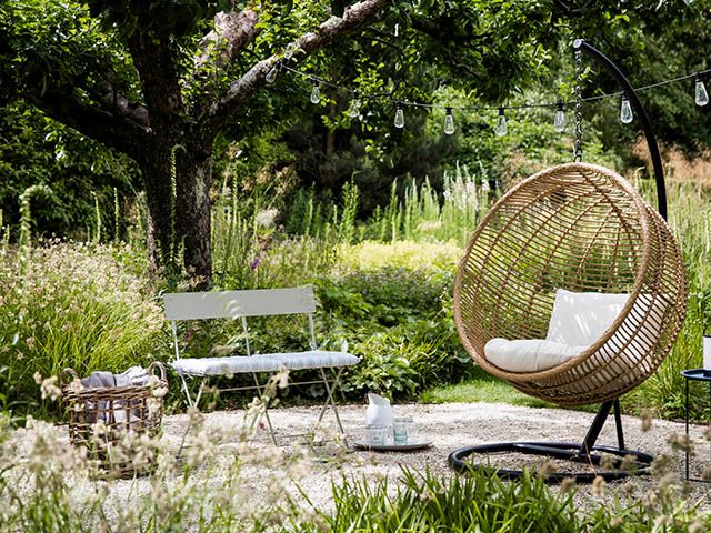 egg chair garden - how to create a cosy garden seating area - garden - goodhomesmagazine.com