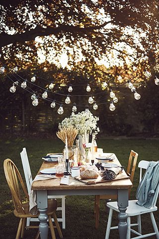 festival style outdoor dining scheme - 6 stylish al fresco dining ideas - garden - goodhomesmagazine.com