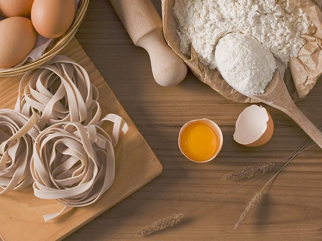 pasta ingredients on wooden worktop - the best Instagram cookalongs to watch during lockdown - kitchen - goodhomesmagazine.com