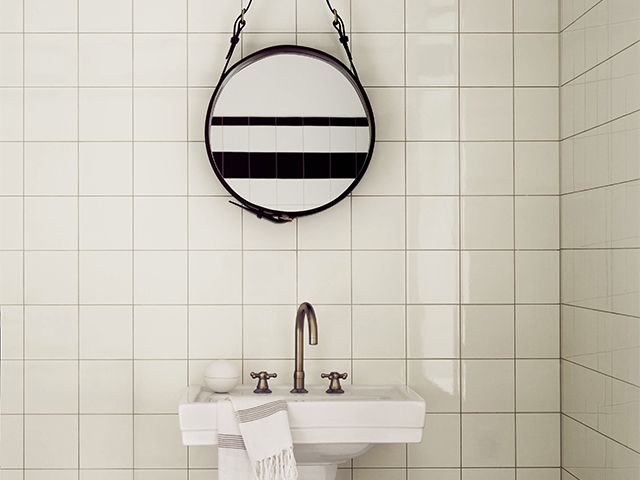 bathroom hanging mirror - how to make your bathroom look more expensive - bathroom - goodhomesmagazine.com