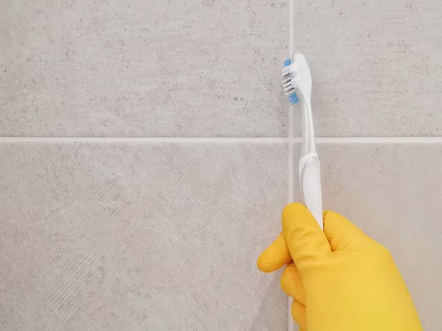 cleaning grout - - 9 ways to prepare your house for sale after lockdown - inspiration - goodhomesmagazine.com
