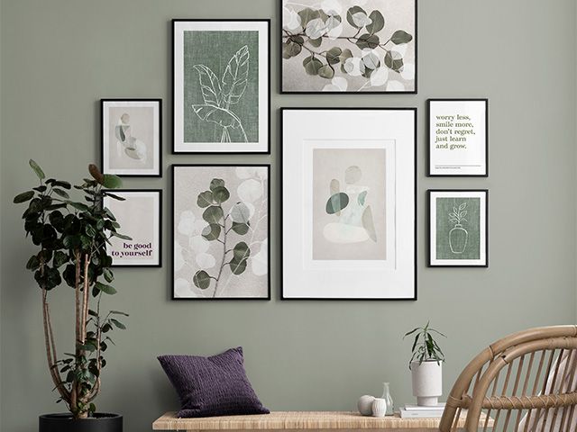 gallery wall on green - how to feng shui your home during lockdown - inspiration - goodhomesmagazine.com