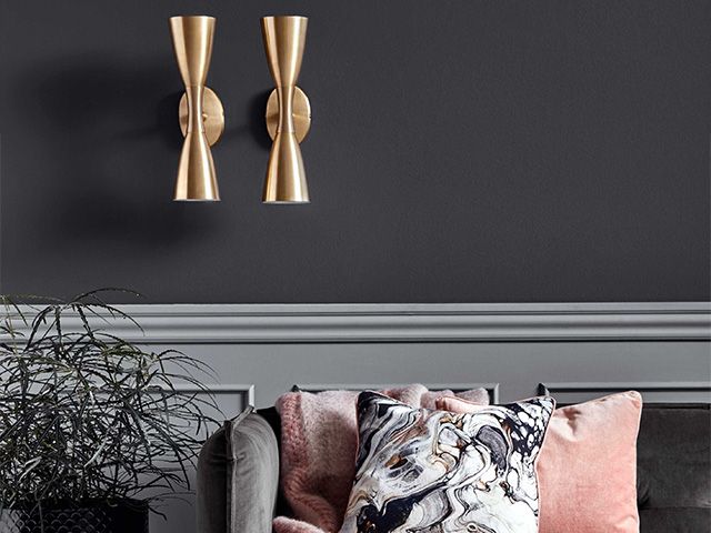 gold double wall lights - 6 unique and stylish ways to use wall lights - inspiration - goodhomesmagazine.com