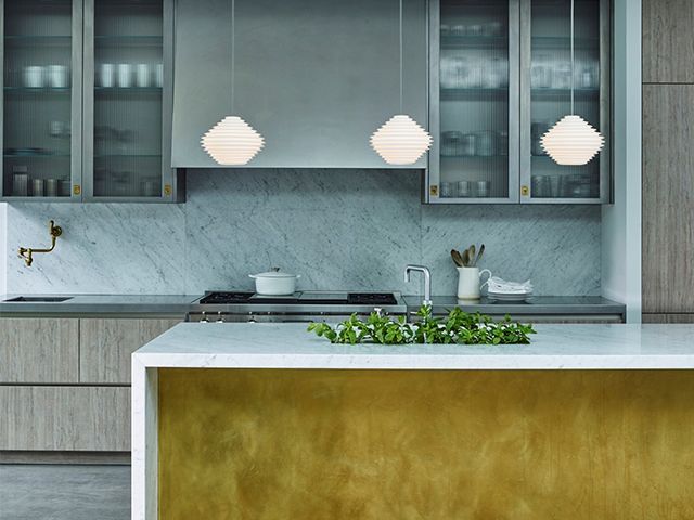  gold kitchen island - 5 ways to add wow factor to your interiors - inspiration - goodhomesmagazine.com