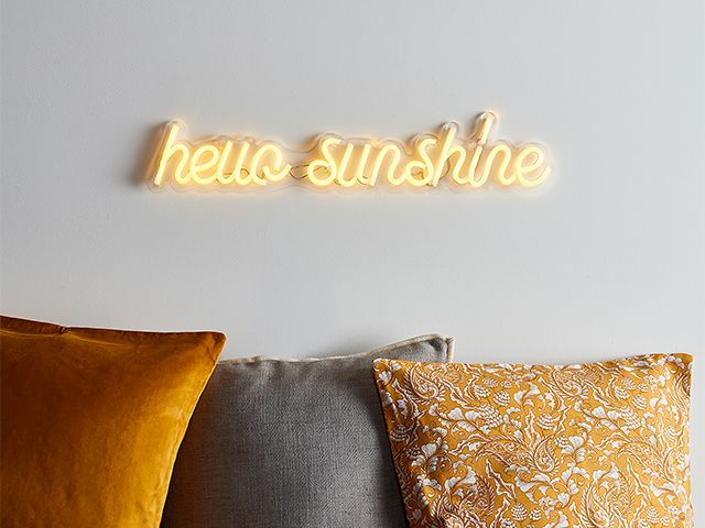 hello sunshine neon light - 6 unique and stylish ways to use wall lights - inspiration - goodhomesmagazine.com