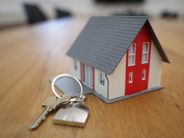 mini house and keys - money-saving tips for first time buyers during lockdown - inspiration - goodhomesmagazine.com
