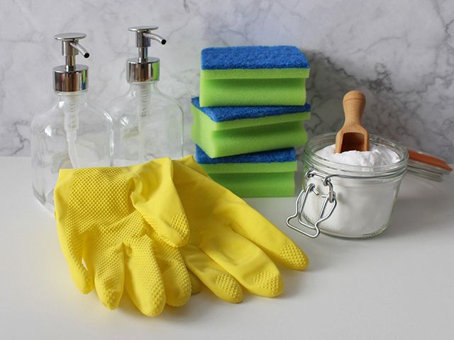 rubber gloves on worktop - how to work with tradesmen during the current lockdown - inspiration - goodhomesmagazine.com