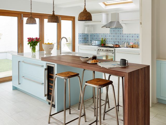 kitchen cabinet with swing out breakfast bar