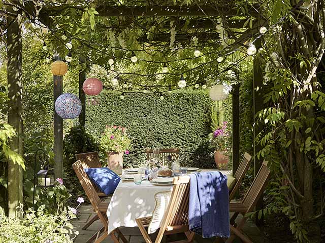 Outdoor dining area with statement garden accessories