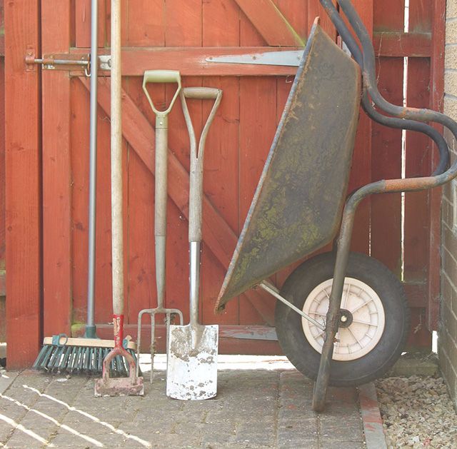 garden tools and wheel barrow - goodhomesmagazine.com