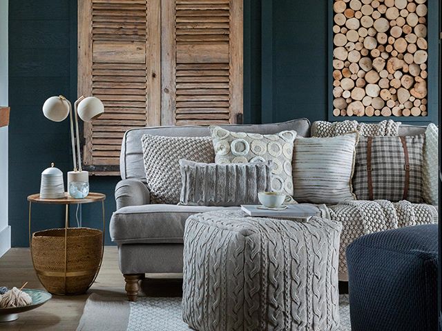 grey sofa in navy lounge - 7 decorating tips for first-time homeowners - inspiration - goodhomesmagazine.com