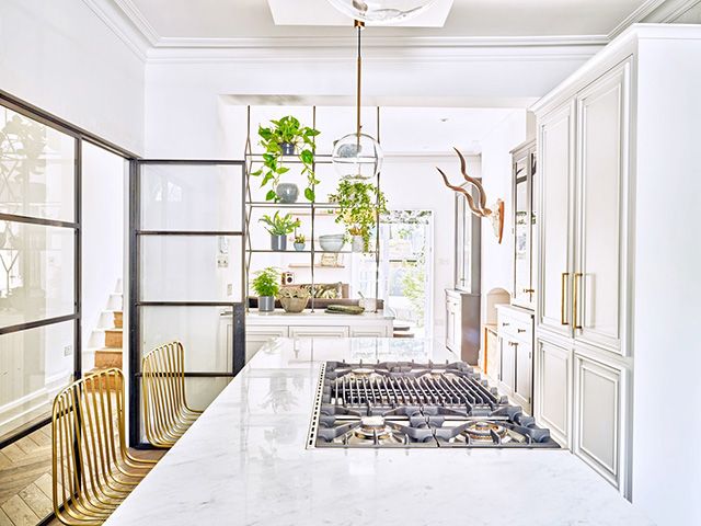 white kitchen with broken plan layout - goodhomesmagazine.com