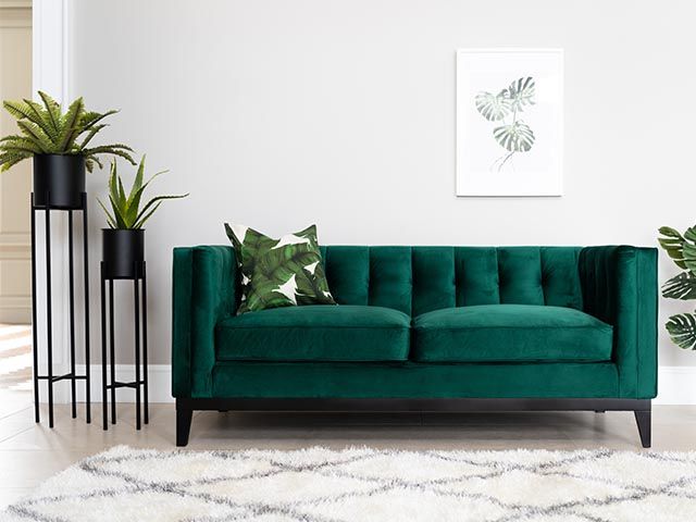 living room velvet sofa - how to get the boutique hotel look at home - inspiration - goodhomesmagazine.com