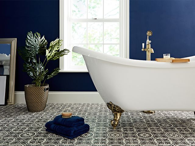 navy bathroom with gold claw bath - win £1,000 worth of bathroom goodies - competitions - goodhomesmagazine.com