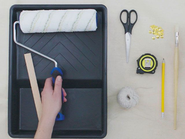 roller and tray - how to paint a perfect circle wall design - inspiration - goodhomesmagazine.com