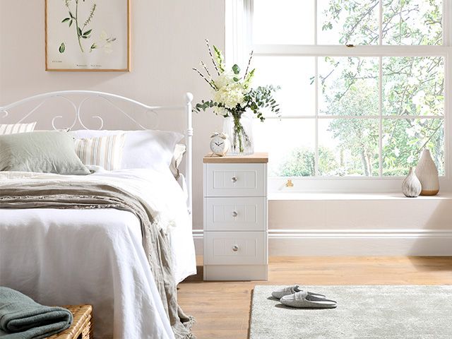 traditional white wood bedside table - 6 bedside tables for compact bedrooms - bedroom - goodhomesmagazine.com