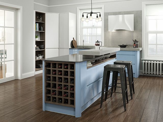wine rack in blue kitchen - how the coronavirus has affected kitchen design - kitchen - goodhomesmagazine.com