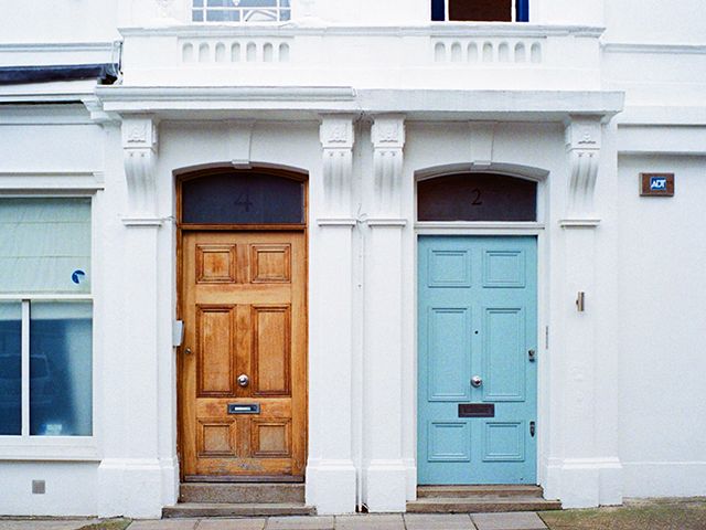 wooden front door - what does the colour of your front door say about you? - inspiration - goodhomesmagazine.com