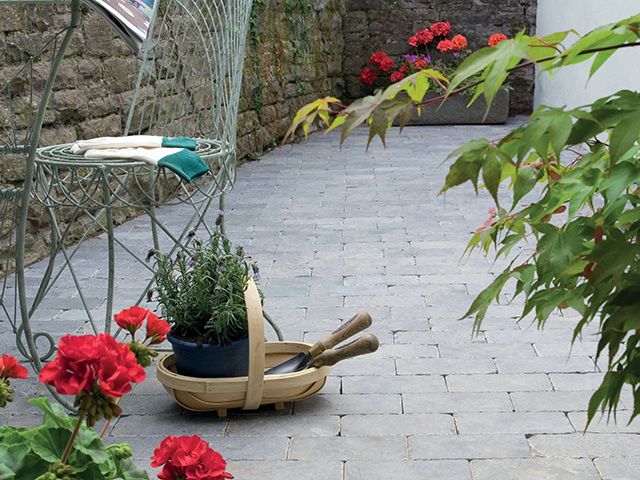 garden with natural stone pavers - garden - goodhomesmagazine.com