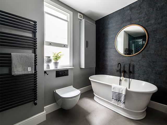 black bathroom radiator - take a look at this stylish family bathroom with statement tiles - bathroom - goodhomesmagazine.com