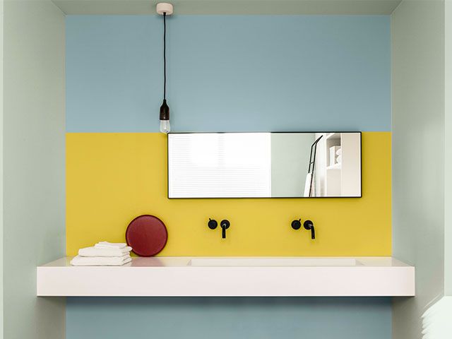 black taps in yellow bathroom - design ideas for statement bathrooms - bathroom - goodhomesmagazine.com