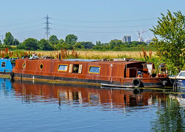 house boat with corten steel cladding - house tours - goodhomesmagazine.com